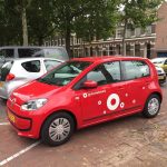 Greenwheels auto met het nieuwe frisse witte logo.